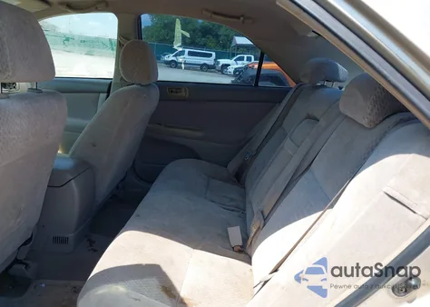 2002 Toyota Camry Le z USA, uszkodzony, nr VIN 4T1BE32K12U577914